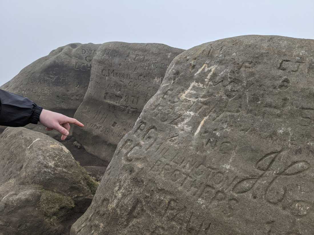 Carvings commemorating the fallen, amongst other visitors